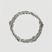Silver beaded nugget bracelet with 4.5mm beads strung along the length, shown on a plain background.