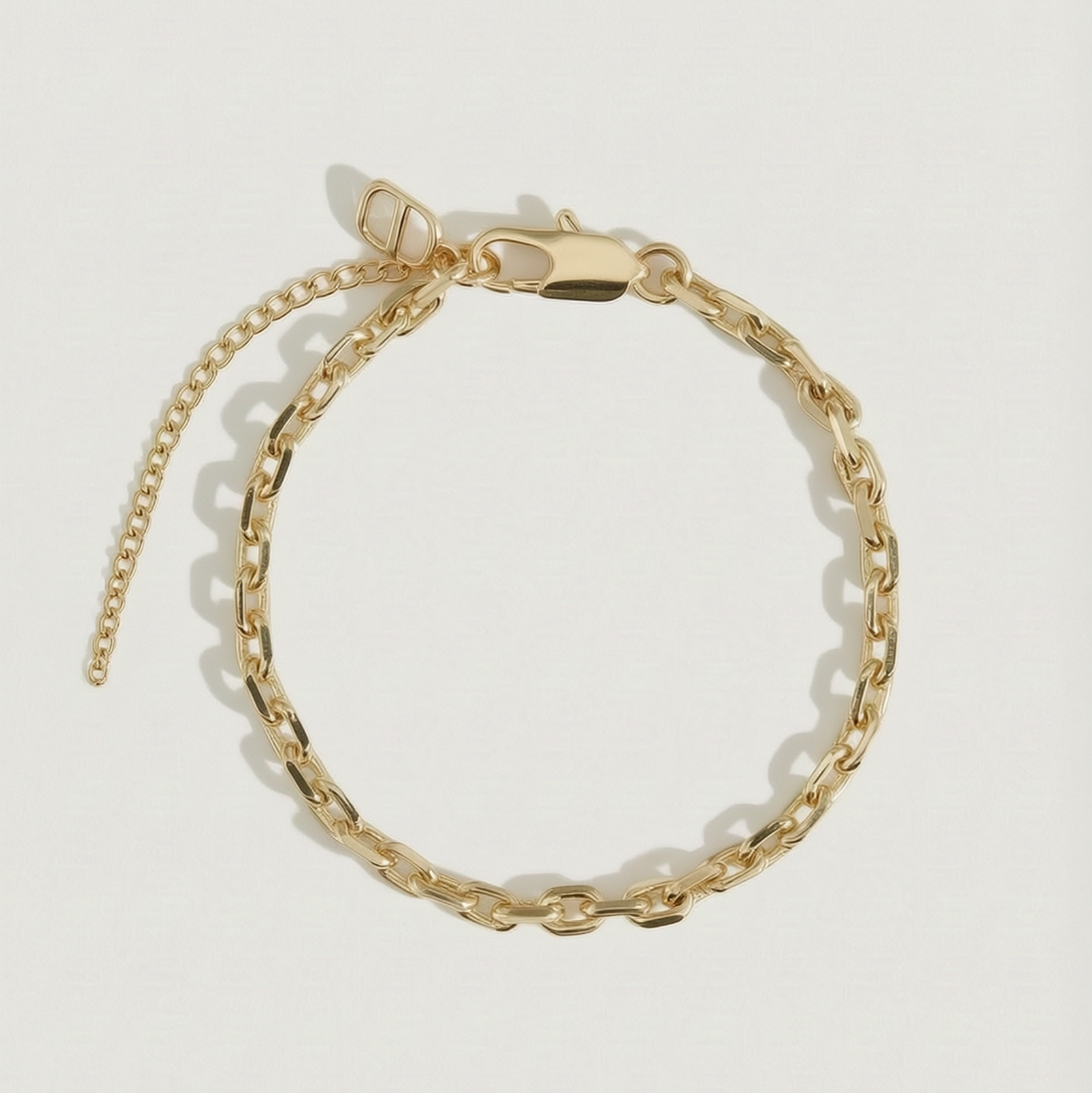 14k gold plated squoval link chain anklet, shown on a plain background.