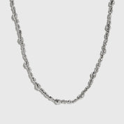 Silver beaded nugget necklace with 4mm beads strung along the chain, shown on a plain background.
