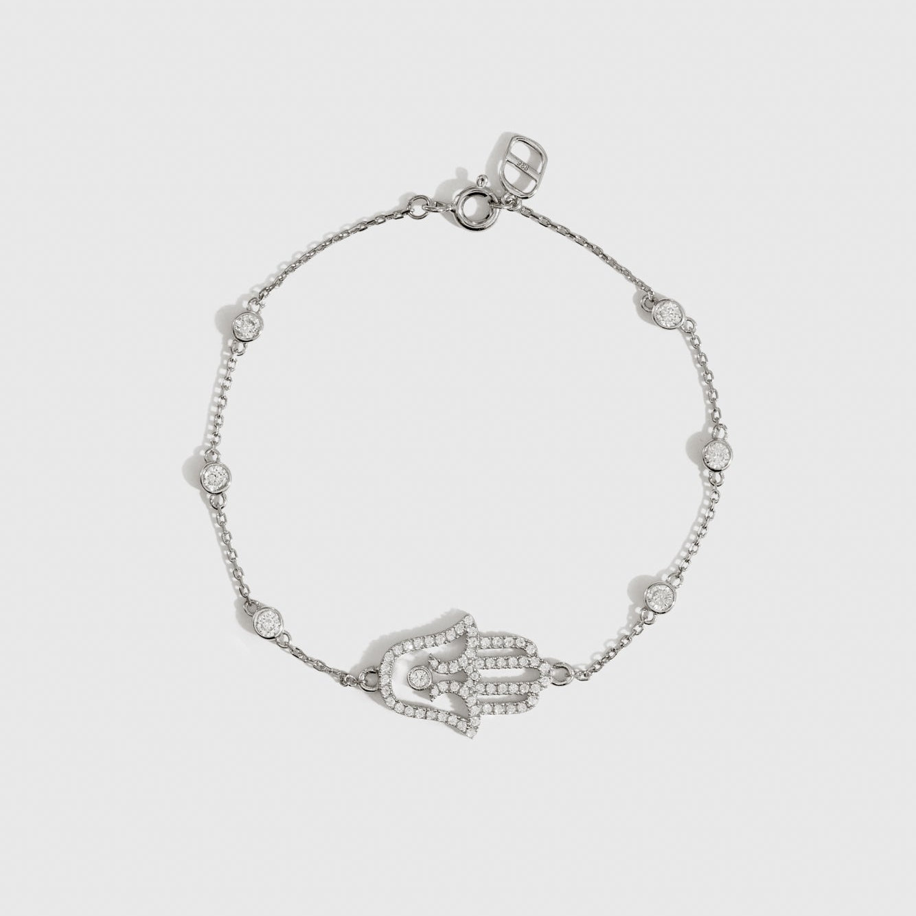 Sterling silver 925 hamsa pavé bracelet with cubic zirconia, shown on a plain background.
