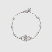 Sterling silver 925 hamsa pavé bracelet with cubic zirconia, shown on a plain background.