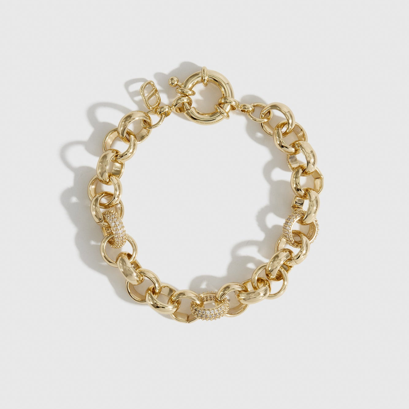 14k gold plated maximalist rolo pavé bracelet with pavé cubic zirconia, shown on a plain background.