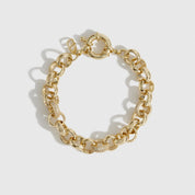 14k gold plated maximalist rolo pavé bracelet with pavé cubic zirconia, shown on a plain background.