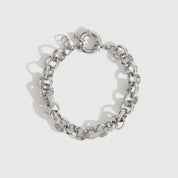 Silver plated maximalist rolo pavé bracelet with pavé cubic zirconia, shown on a plain background.