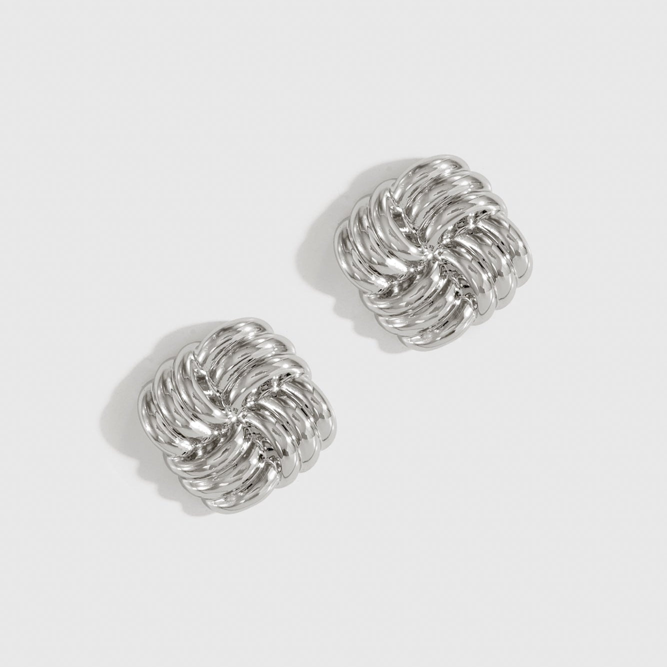 Silver plated mini retro stud earrings, shown on a plain background.