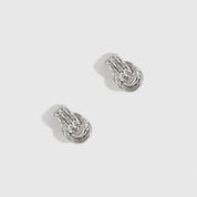Silver plated mini twist stud earrings, shown on a plain background.