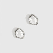 Silver plated baroque pearl stud earrings with a baroque glass pearl, shown on a plain background.