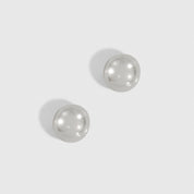 Silver plated mini puffy dome stud earrings, shown on a plain background.