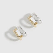 Mixed metal double bare hoop earrings, shown on a plain background.