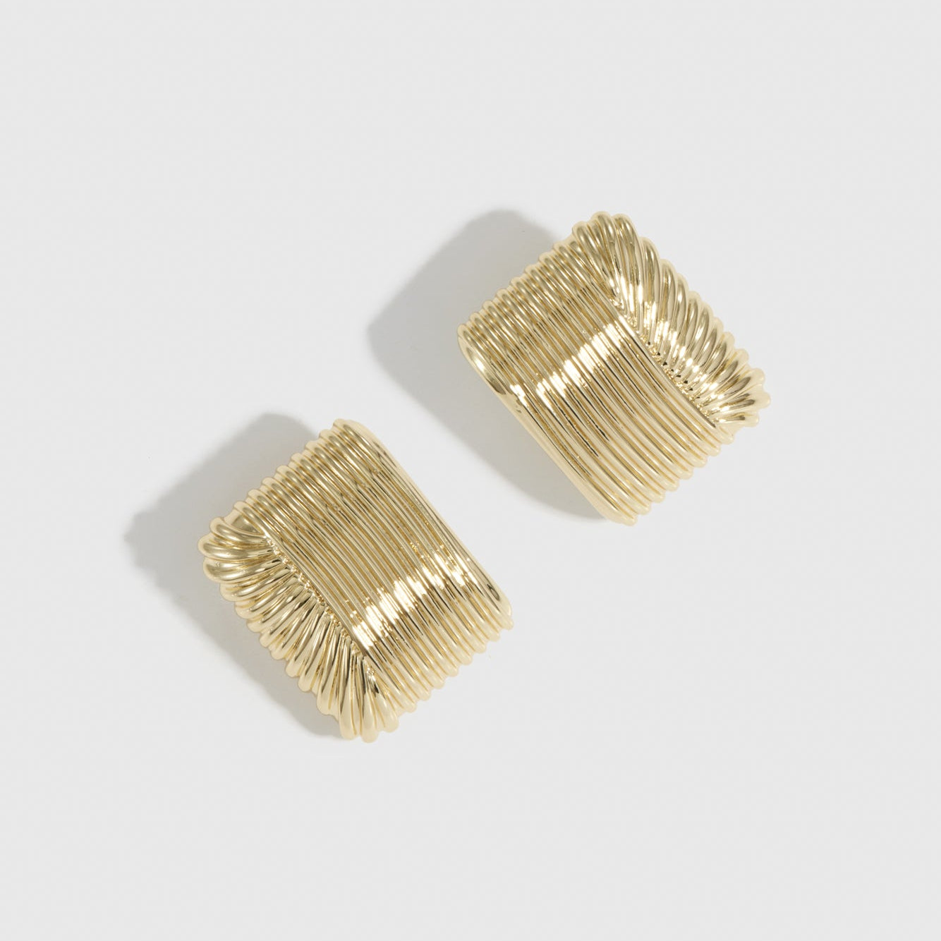 14k gold plated bold stud earrings, shown on a plain background.