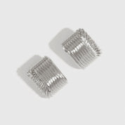 Silver plated bold stud earrings, shown on a plain background.