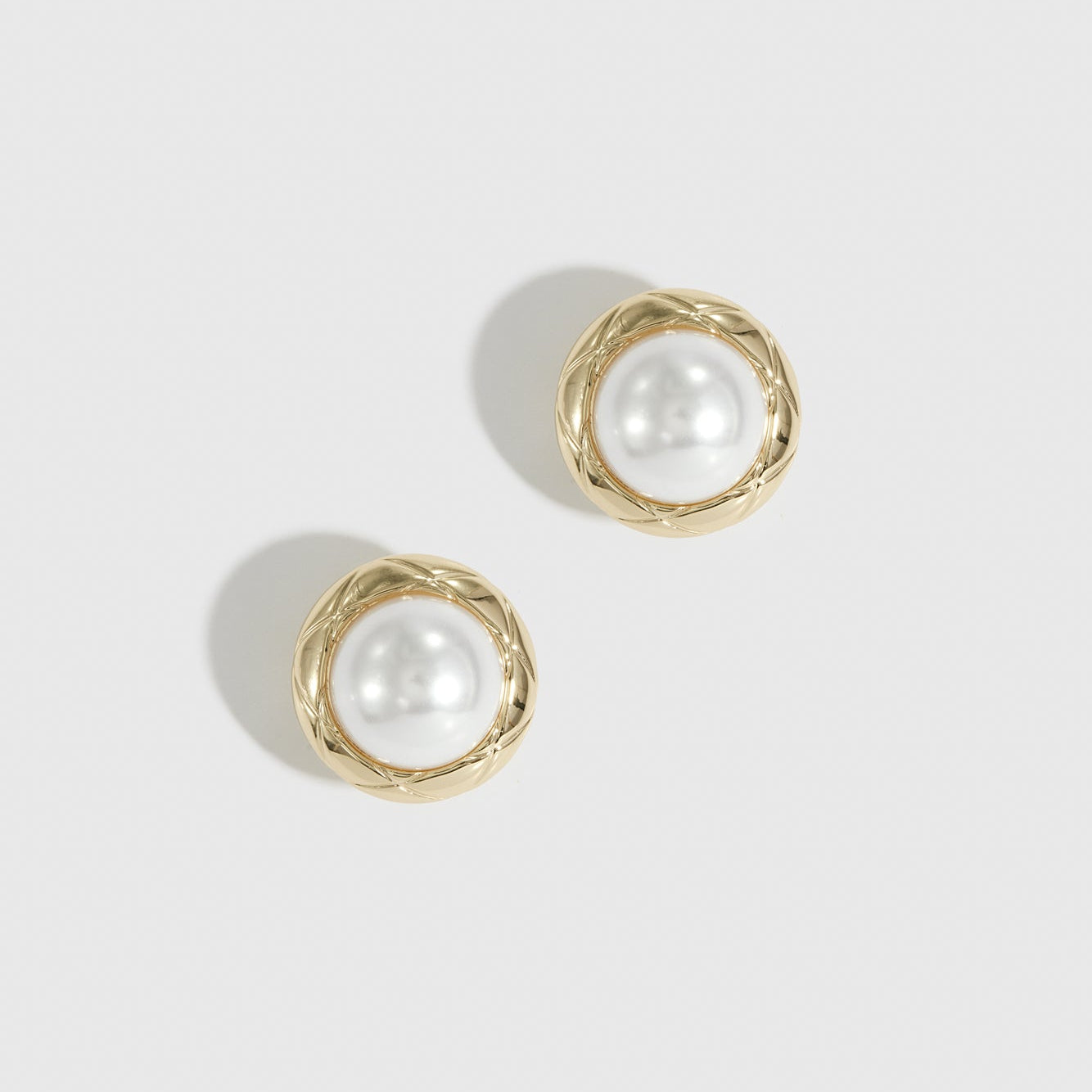 14k gold plated Coco stud earrings with a glass pearl, shown on a plain background.