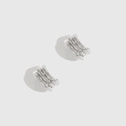 Silver plated triple stud earrings, shown on a plain background.