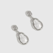 Silver plated pearl pendant earrings with baroque glass pearls, shown on a plain background.