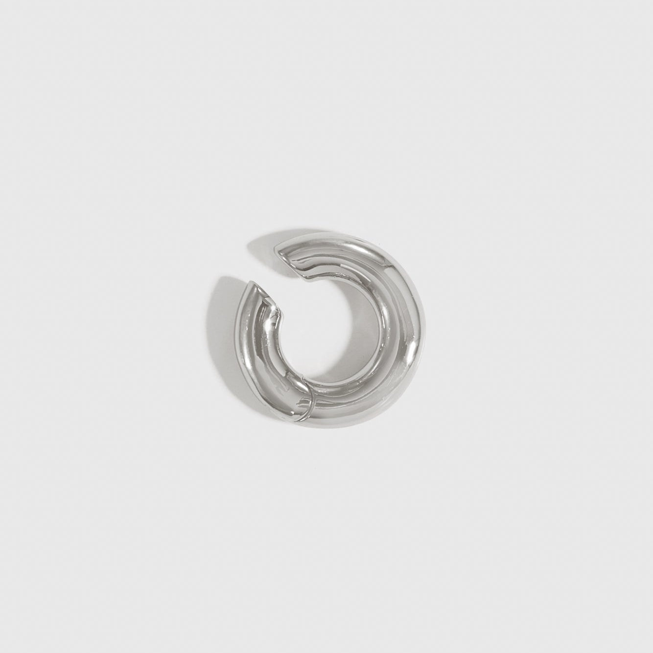 Silver plated tube ear cuff, shown on a plain background.