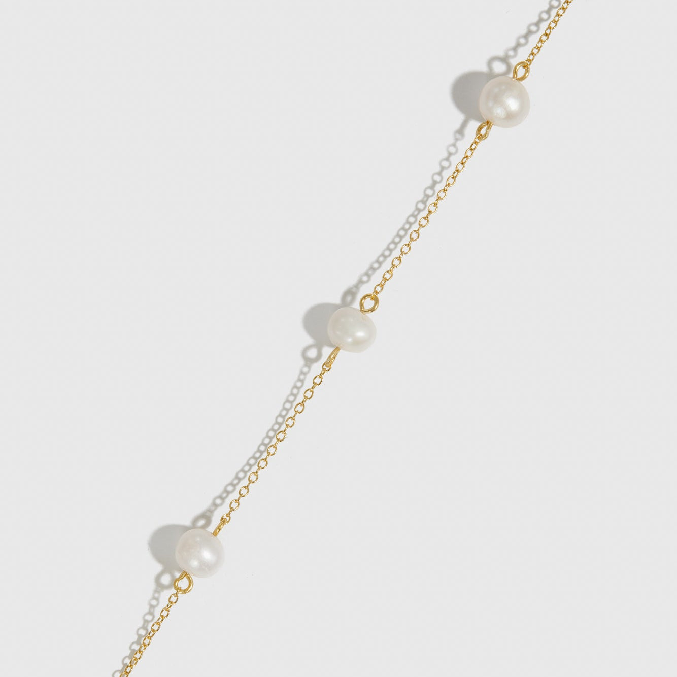 Collier Perles Espacées