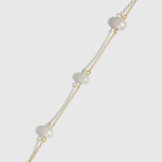 Collier Perles Espacées