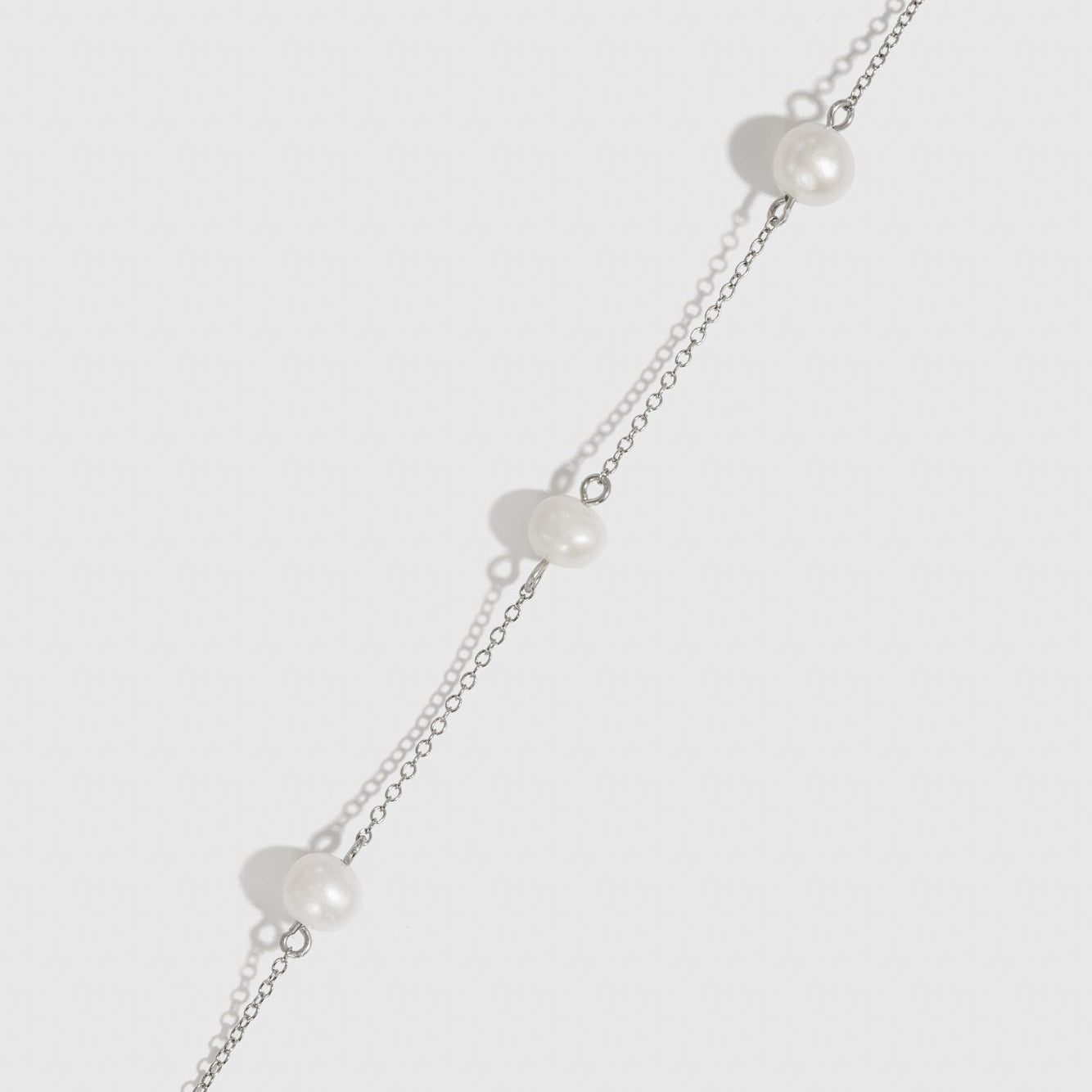 Collier Perles Espacées