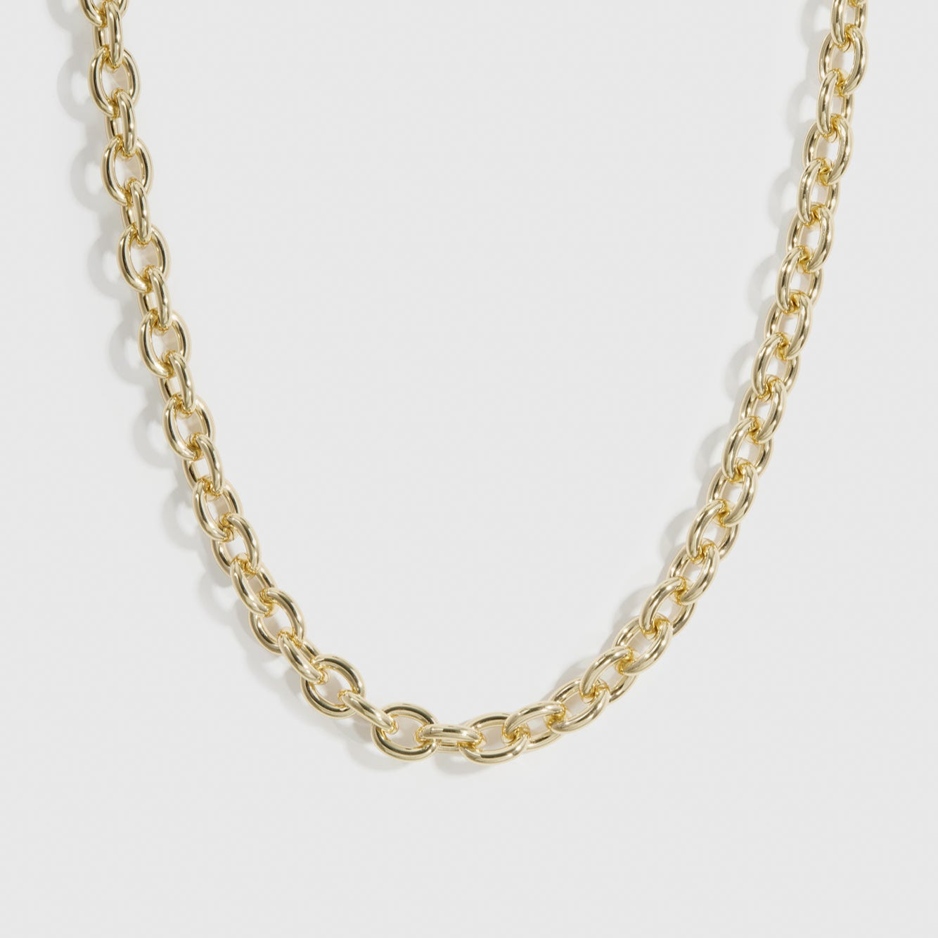 14k gold plated small oval link necklace, shown on a plain background.
