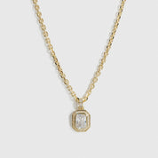 14k gold plated baguette pavé pendant necklace with cubic zirconia, shown on a plain background.