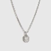 Silver plated baguette pavé pendant necklace with cubic zirconia, shown on a plain background.