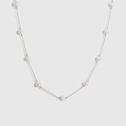 Sterling silver 925 pearls by the yard necklace with freshwater pearls, shown on a plain background.