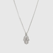 Sterling silver 925 hamsa pavé pendant necklace with cubic zirconia, shown on a plain background.