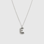 Sterling silver 925 liquid bubble letter pendant necklace, shown on a plain background.