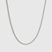 Silver plated small beaded necklace, shown on a plain background.