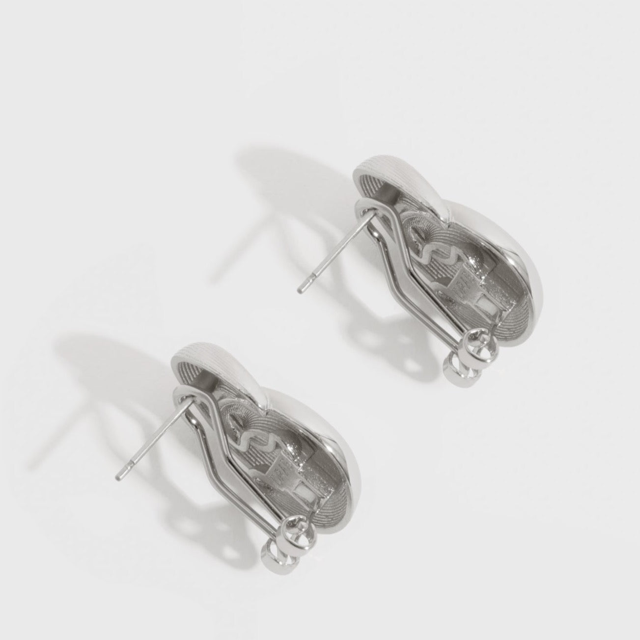 Boutons d'Oreilles Infini