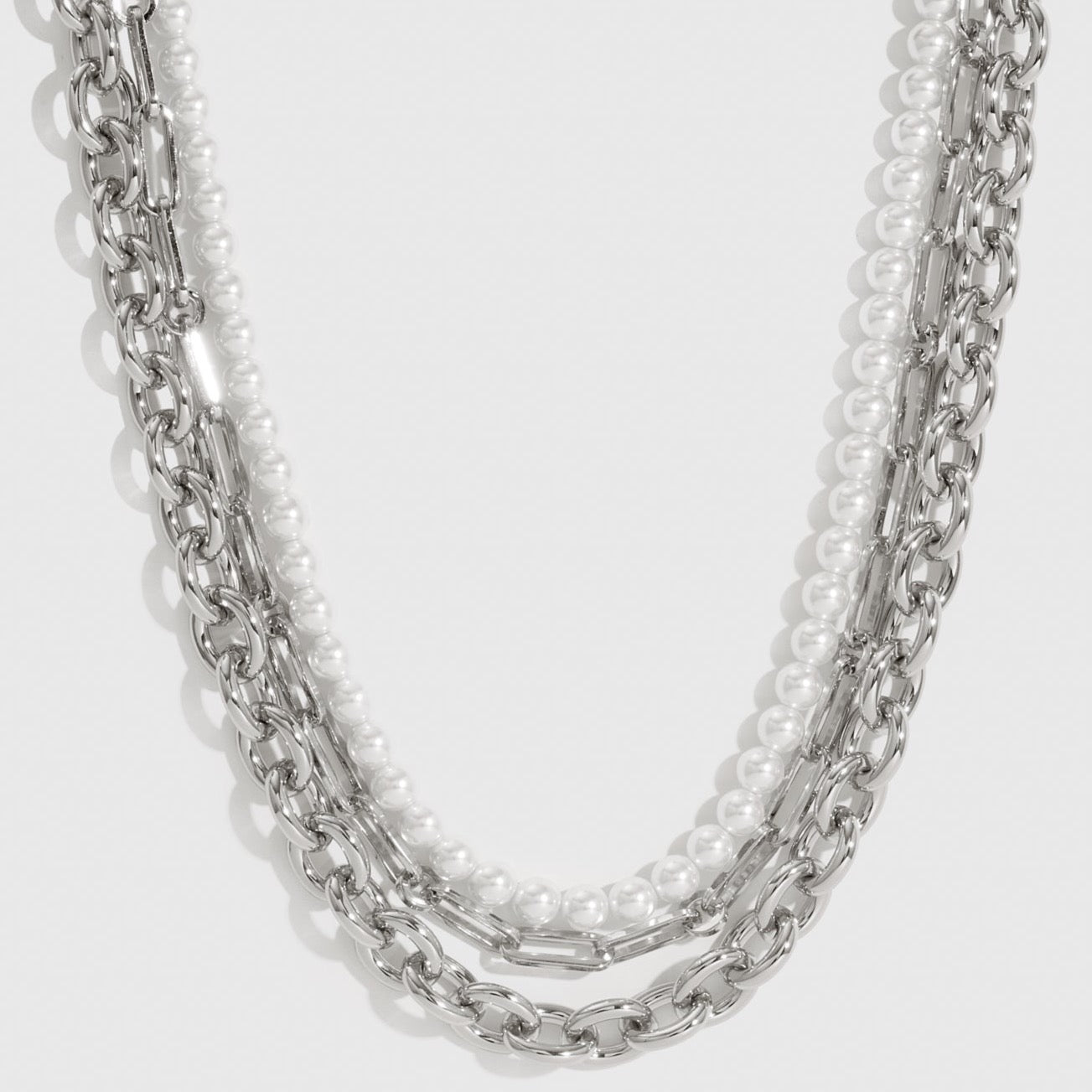Silver plated Nova necklace with pearls, shown on a plain background.