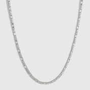 Silver plated Amina tennis necklace with round and baguette cubic zirconia, shown on a plain background.