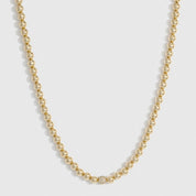 14k gold plated refined necklace with cubic zirconia and a pearl, shown on a plain background.