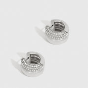 Silver plated festive hoop earrings with cubic zirconia, shown on a plain background.