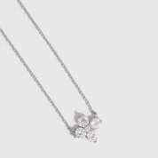 Silver clover motif pendant necklace with cubic zirconia detailing on a cable chain, shown on a plain background.