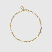 14k gold plated Figaro link chain bracelet, shown on a plain background.