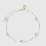 14k gold plated anklet with genuine freshwater pearls strung along a fine chain, shown on a plain background.