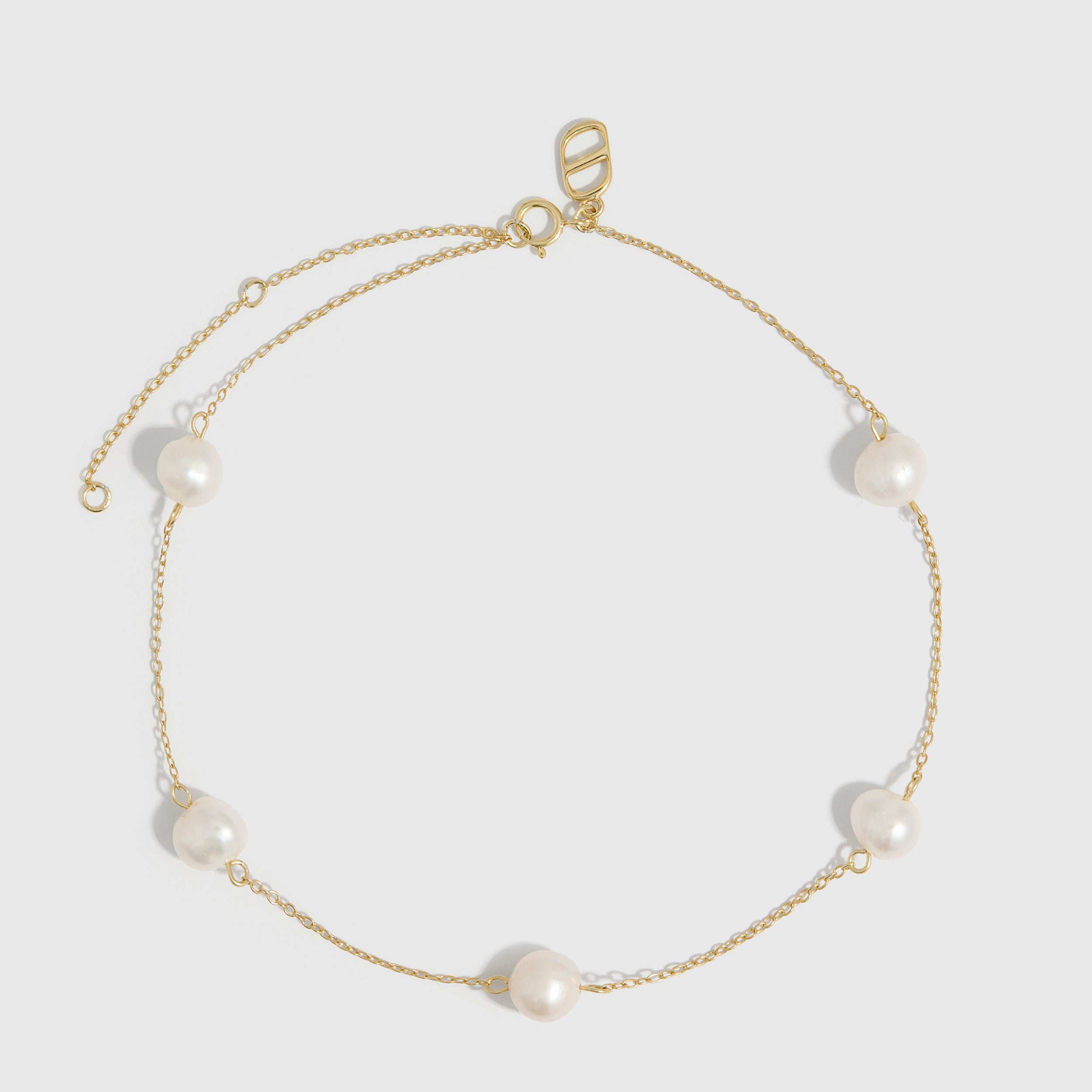14k gold plated anklet with genuine freshwater pearls strung along a fine chain, shown on a plain background.