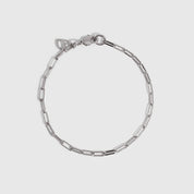 Silver paper clip link chain bracelet, shown on a plain background.