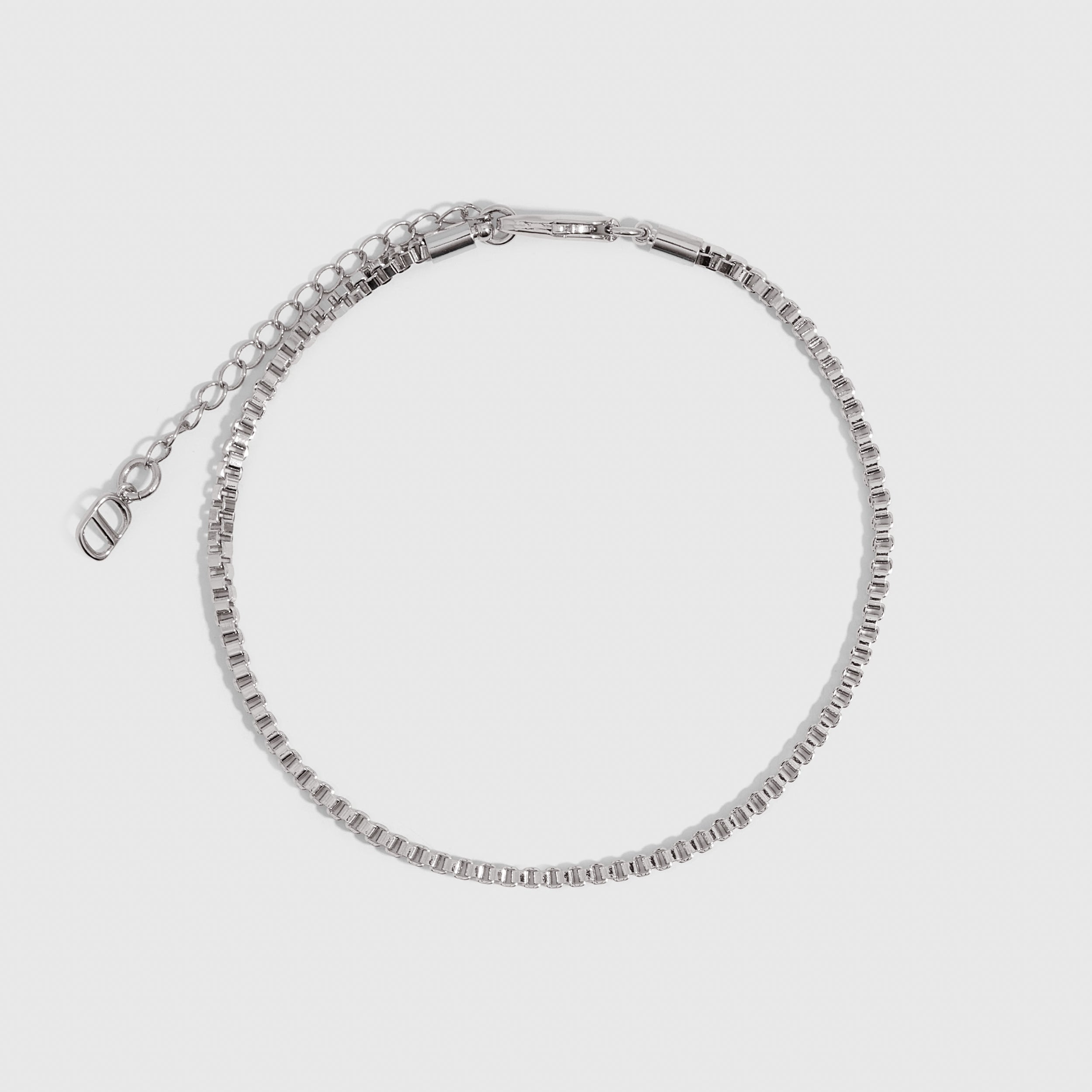 Silver square box link chain anklet, shown on a plain background.