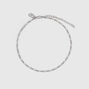 Silver Figaro link chain anklet, shown on a plain background.