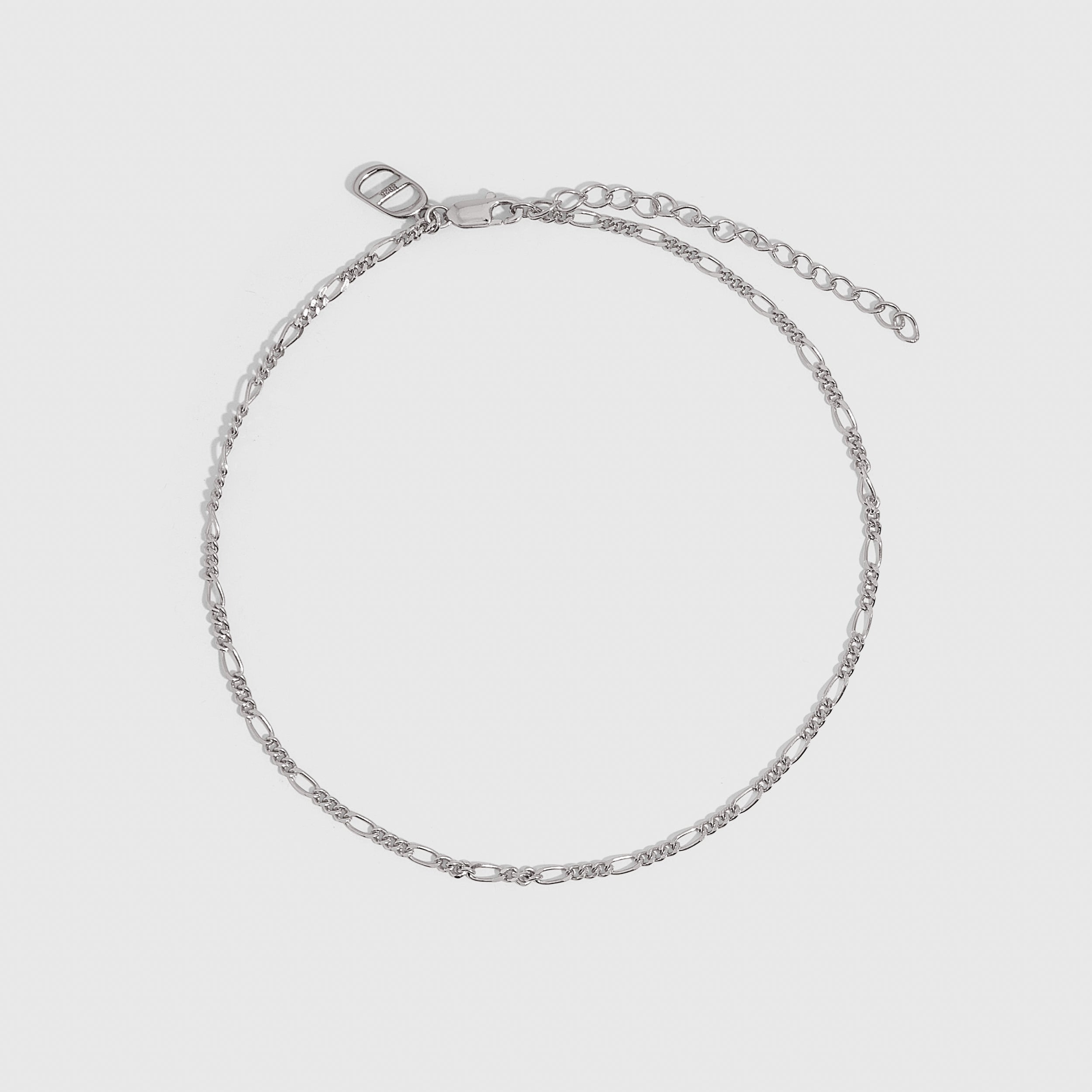 Silver Figaro link chain anklet, shown on a plain background.