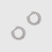 Silver braided texture huggie hoop earrings, shown on a plain background.