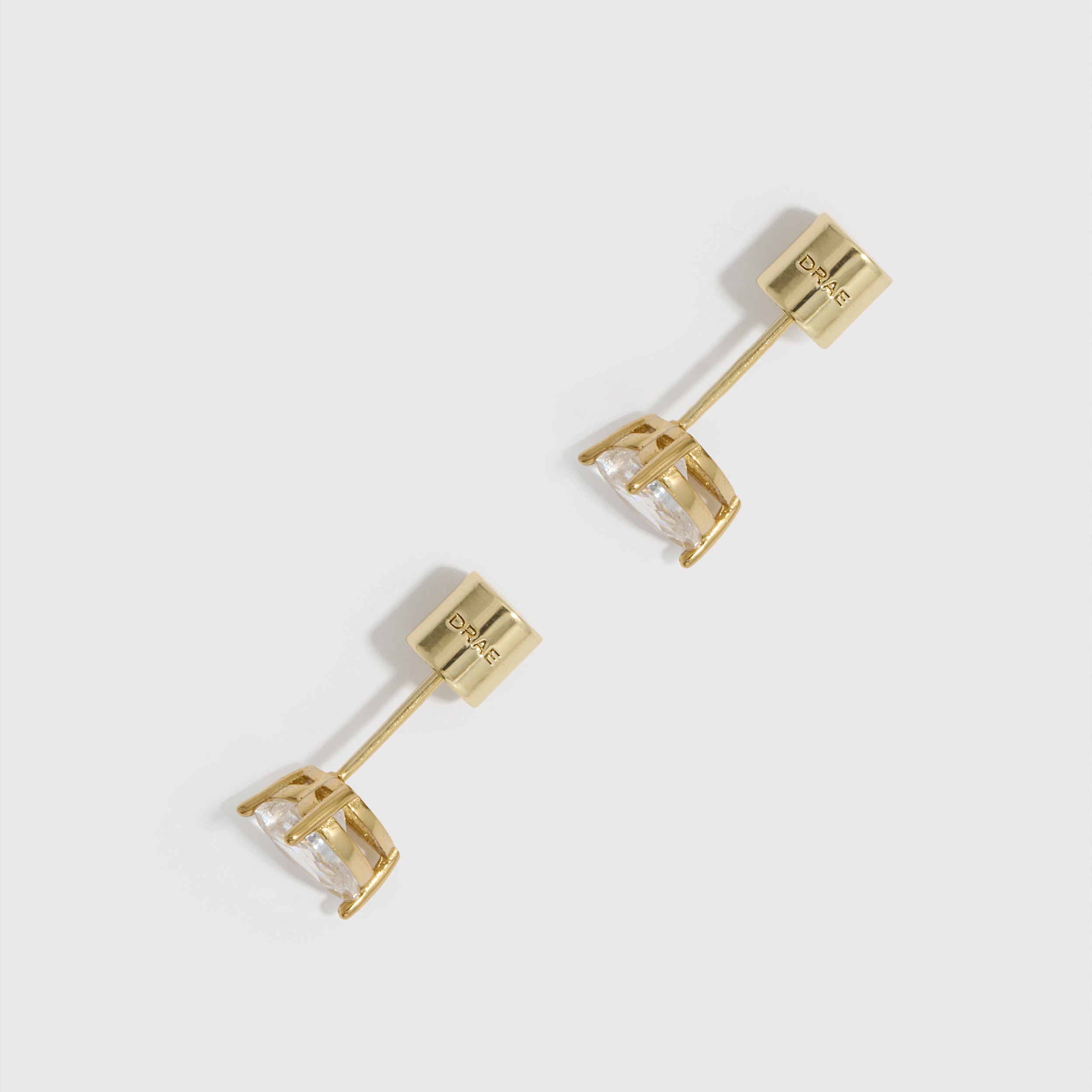 Heart Solitaire Stud Earrings in 14k gold-plated sterling silver with heart-cut cubic zirconia (view 3)