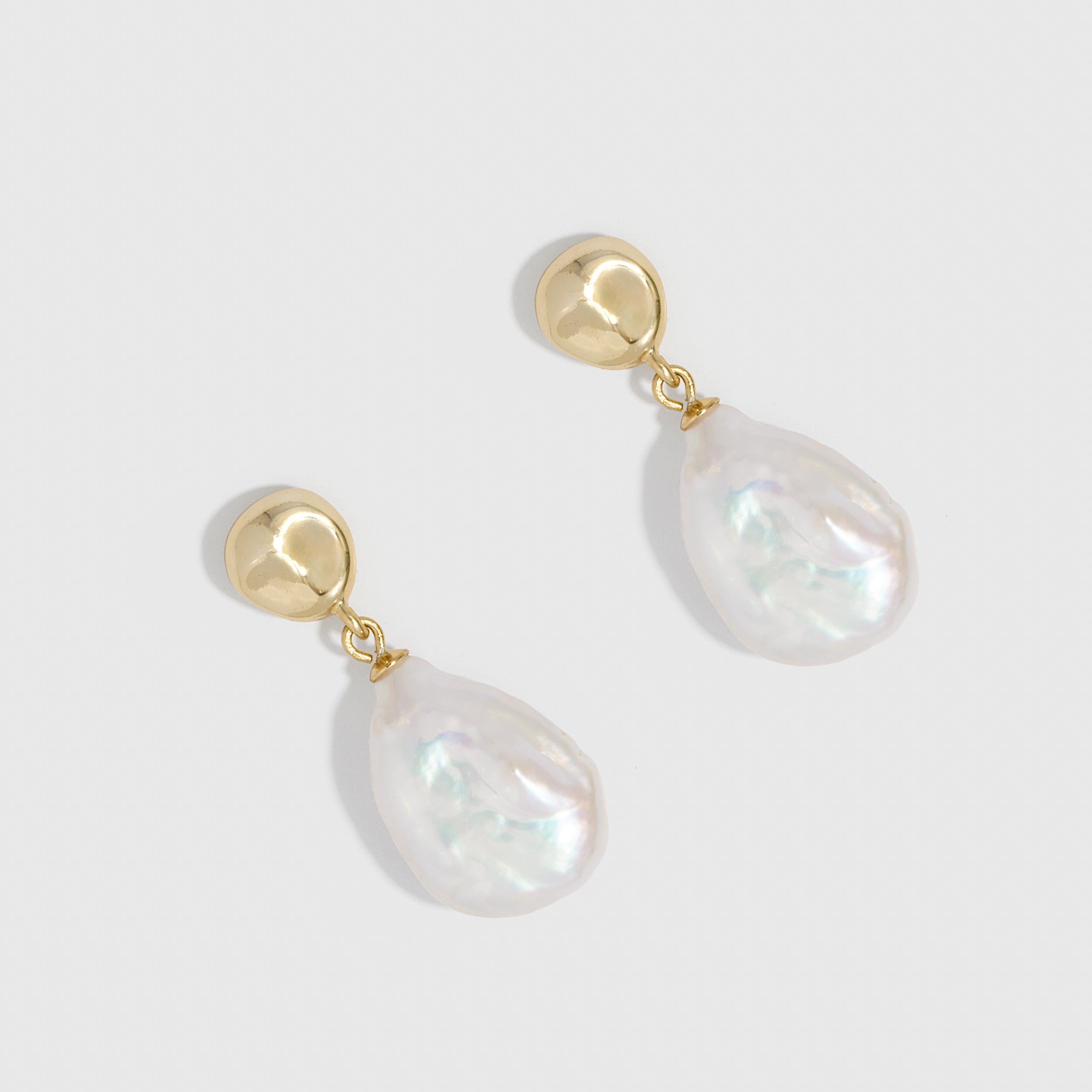 14k gold plated pendant earrings with a genuine irregular baroque pearl drop, shown on a plain background.