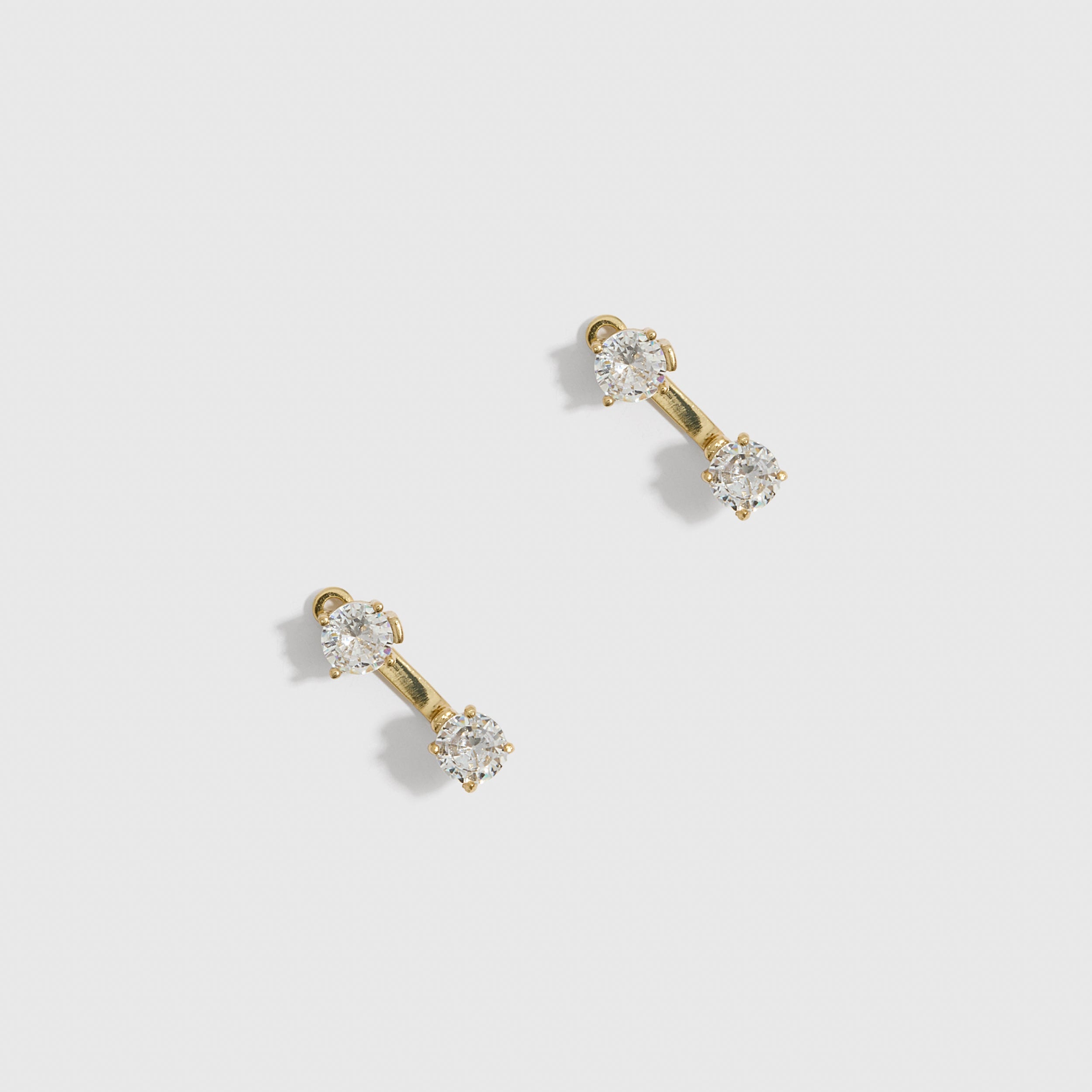 14k gold plated round-cut cubic zirconia barbell stud earrings, shown on a plain background.