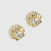 14k gold plated seashell stud earrings with a teardrop-cut cubic zirconia, shown on a plain background.