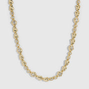 14k gold plated nugget necklace with cubic zirconia nuggets in two sizes on a chain, shown on a plain background.