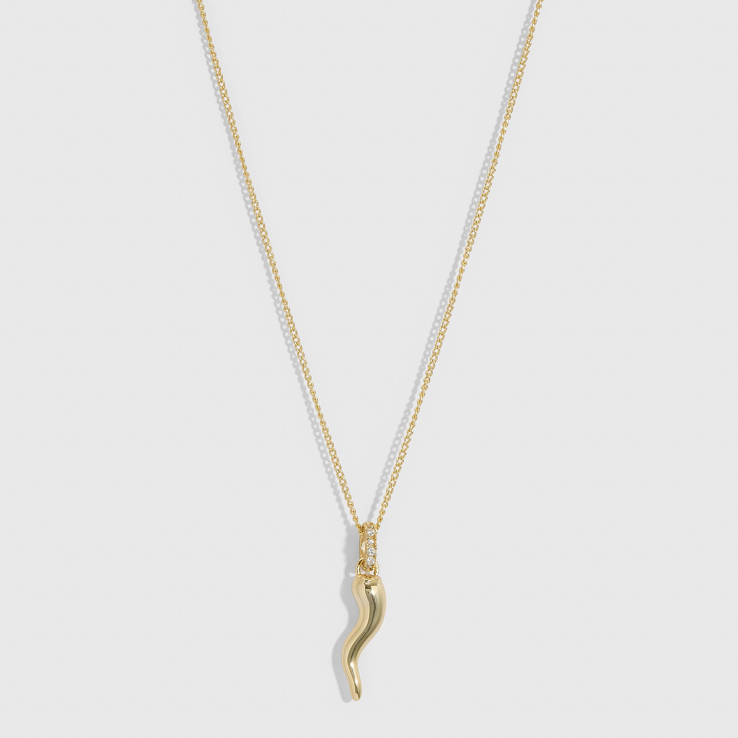 Hollow Italian Horn Pendant Necklace in 14k gold-plated sterling silver with cubic zirconia accents