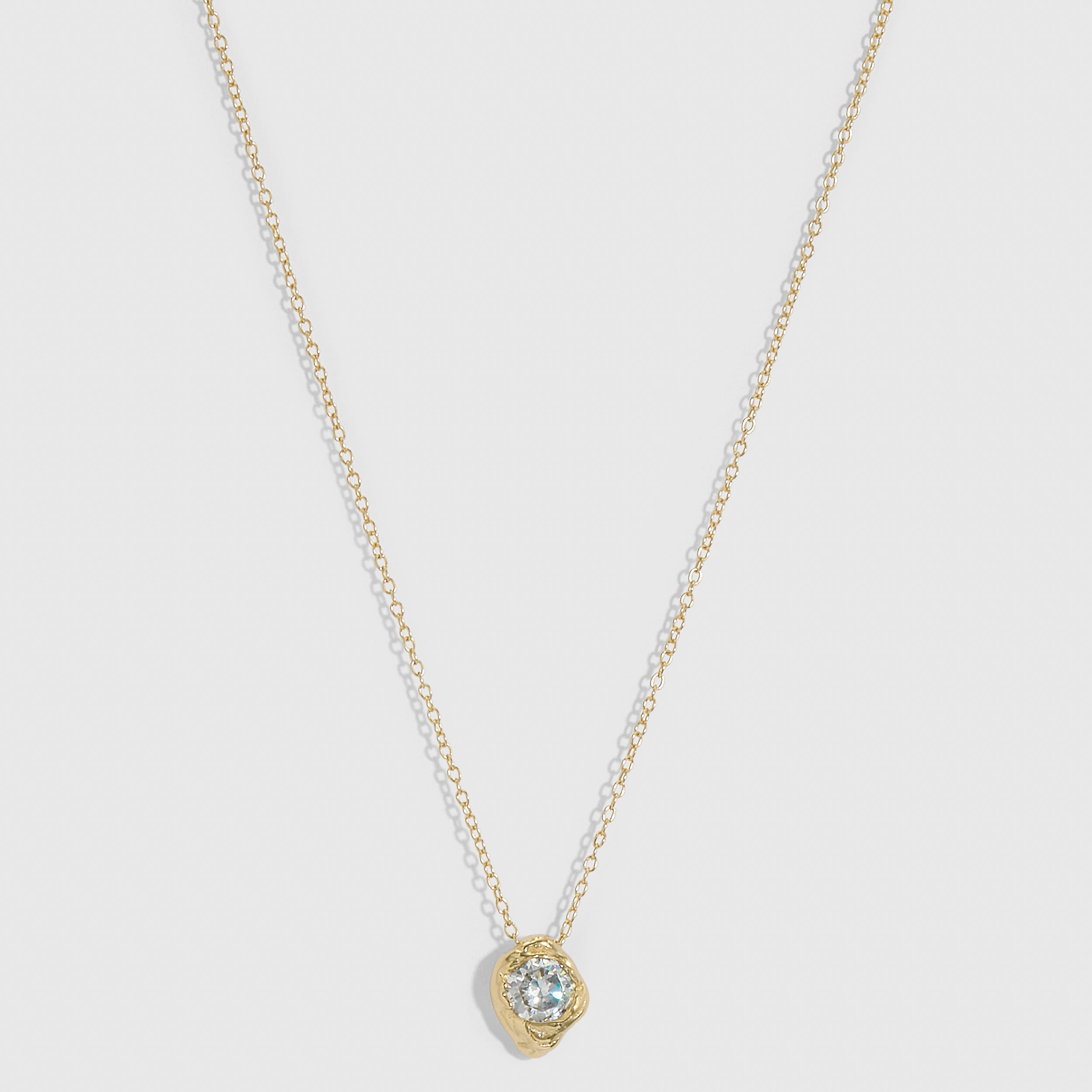 14k gold plated solitaire nugget pendant necklace with bezel-set cubic zirconia, shown on a plain background.